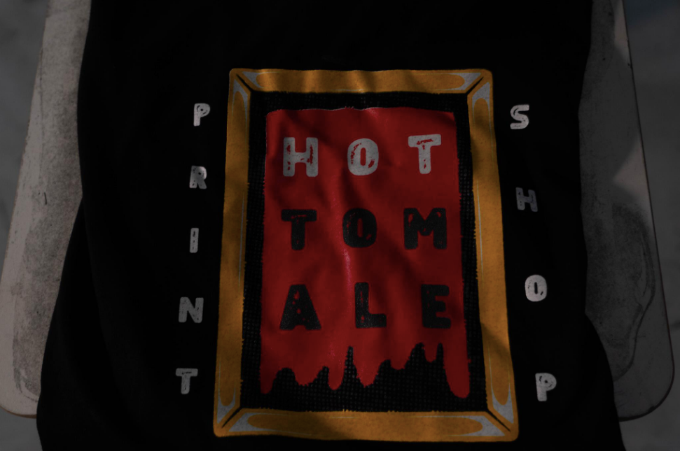 shirt that has a screen printed on it and it says hot tamale print shop