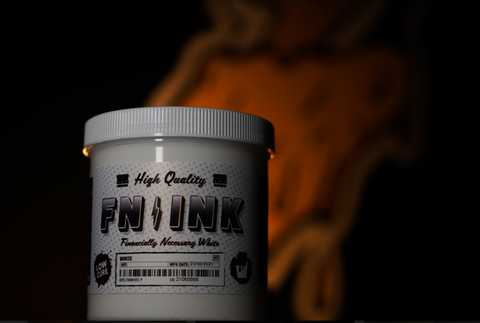 A pint of FN INK sits in front of a lightning bolt