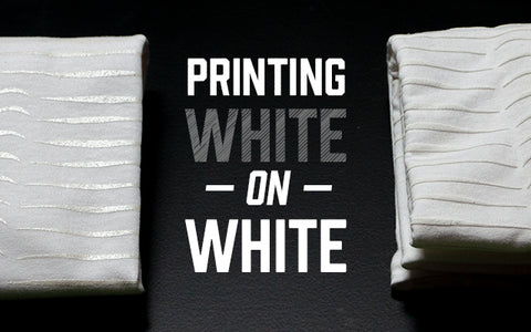 two white shirts with the words "printing white on white" in between