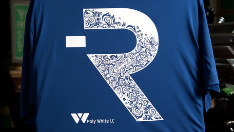 a white print of ryonet's logo on a blue shirt