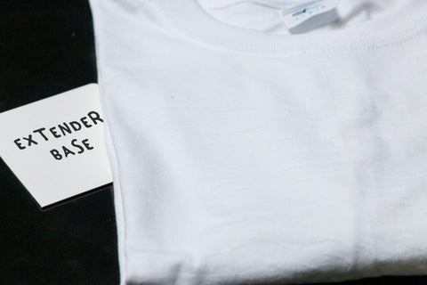 A white shirt with extender base added to white ink