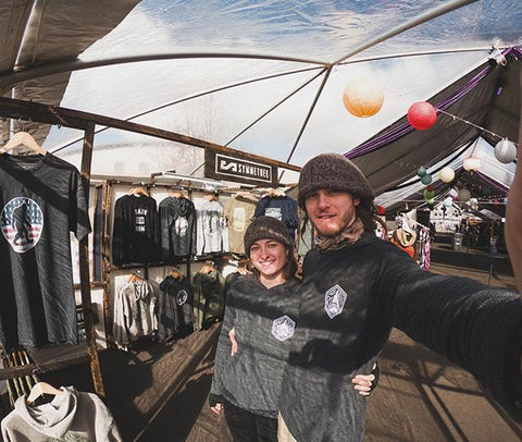 couple at farmer's market booth