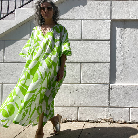 House of Lu Mae Caftan in Color number 42, a bright lime green graphic print on a white background