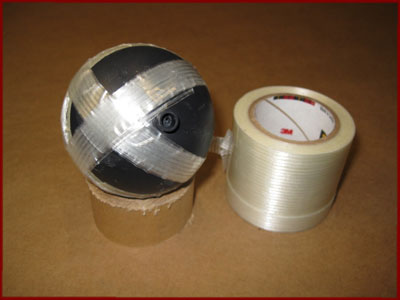 Third band of strapping tape on fireworks shell