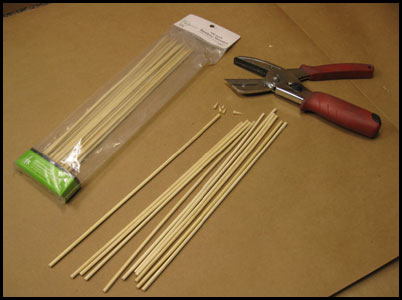 Cutting bamboo skewers for sparkler sticks