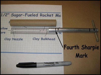 sugar rocket tooling with 4th alignment mark on rammer