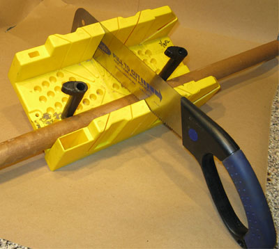 Cutting a Tube, Held in Place with Cams, Using the Miter Box and Pull-Saw