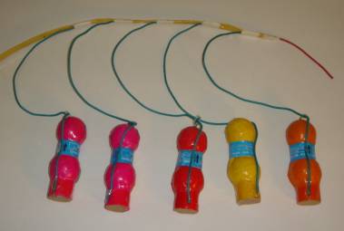 A Quickmatched chain of festival balls. Visco fuse is on the right side