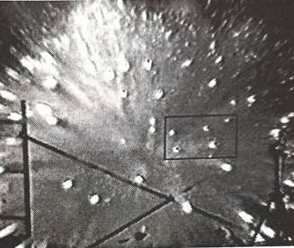 Photo of the explosion of a fireworks shell in a test stand