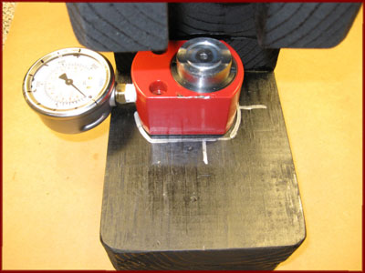 Base of press with best location for pressure gauge marked