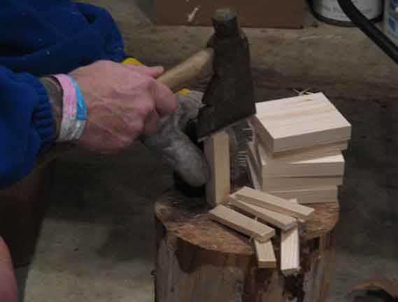 Splitting wood for the quart retort to make charcoal