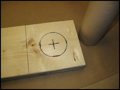 Wood base marked with tube circumference