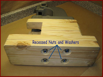 Recessed nuts in the bottom of a homemade wooden arbor press base