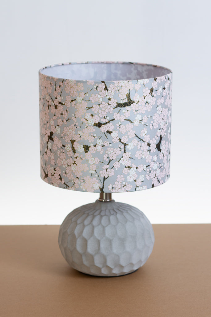 pink round base table lamp