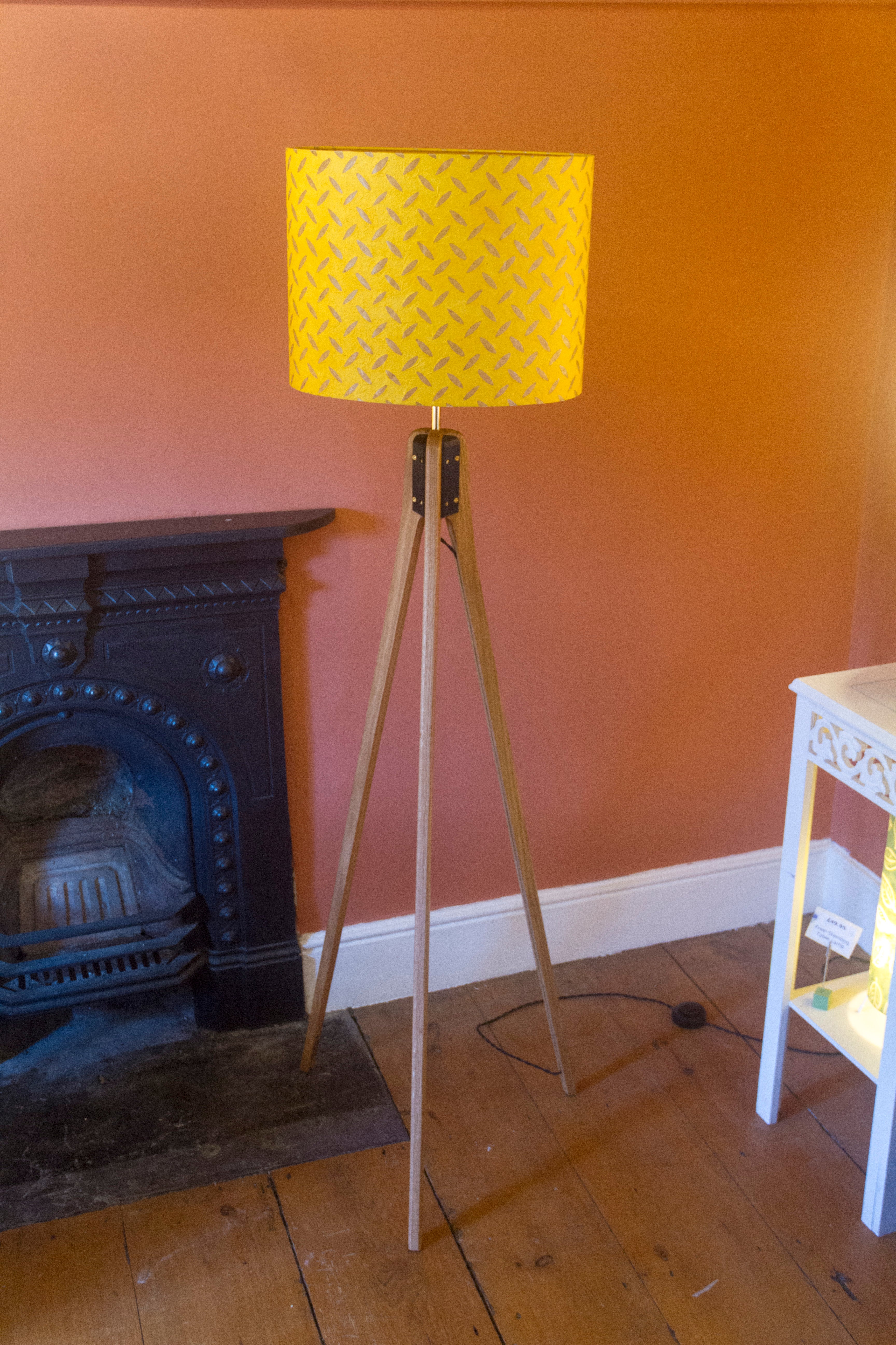 yellow tripod floor lamp