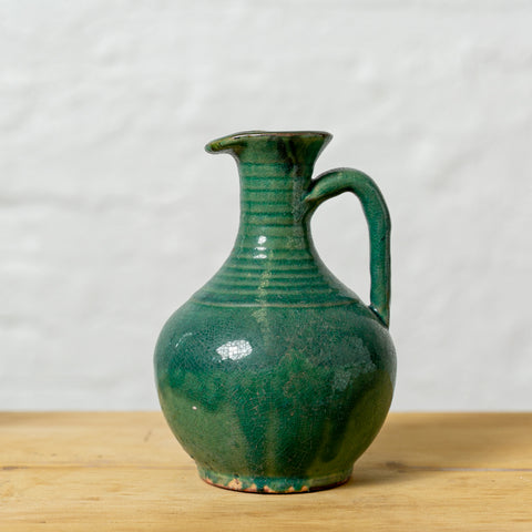 Antique Chinese jug with green glaze