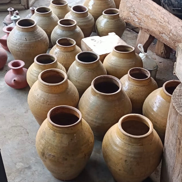 Vintage yellow pots from Indonesia