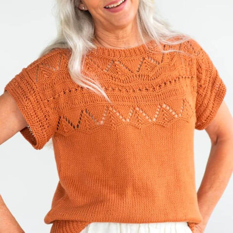 Knit tee pattern with lace design in a summery orange color.