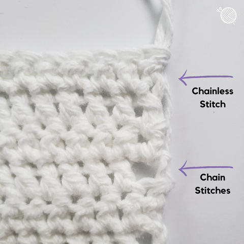 Crochet fabric constructed of double crochet stitches with a chainless double crochet and chain stitches indicated.
