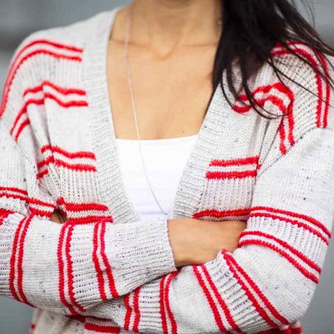 Close up of Long Summer Cardigan in light gray with orange stripes.