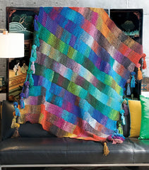 Knit blanket with squares of a variety of bright colors.