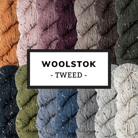 Hanks of all 14 colors of Woolstok Tweed from Blue Sky Fibers.