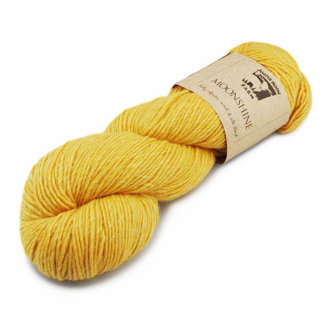 Skein of Juniper Moon Farm Moonshine in a yellow color.