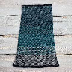 Cowl in gradient of dark teal to medium gray that narrows at the top.