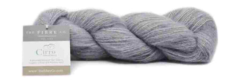 Skein of The Fibre Co. Cirro yarn in a light gray.