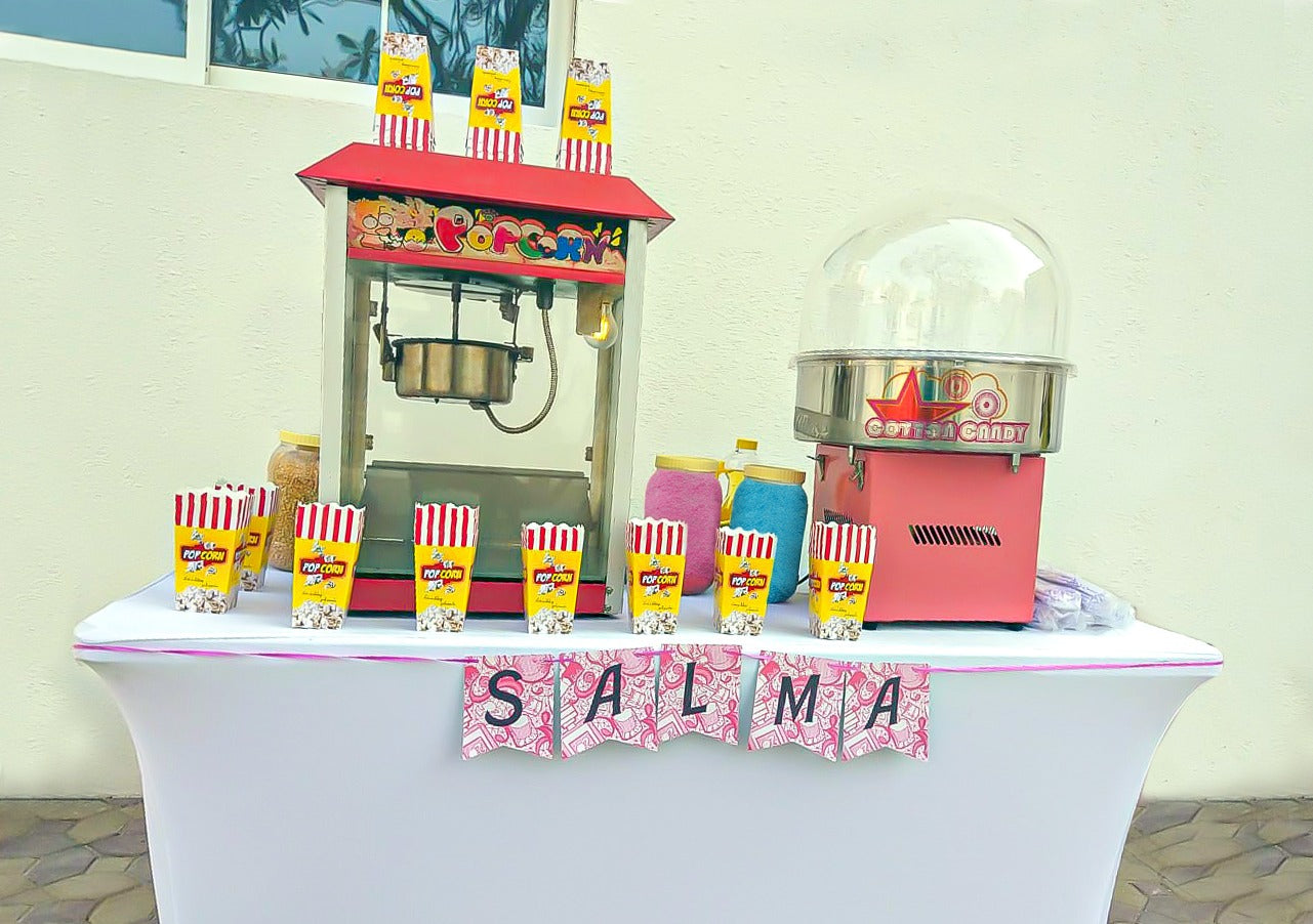 POPCORN MACHINE WITH WHITE TABLE COVER