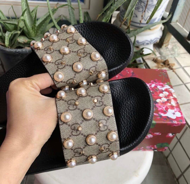 gucci supreme pearl slides