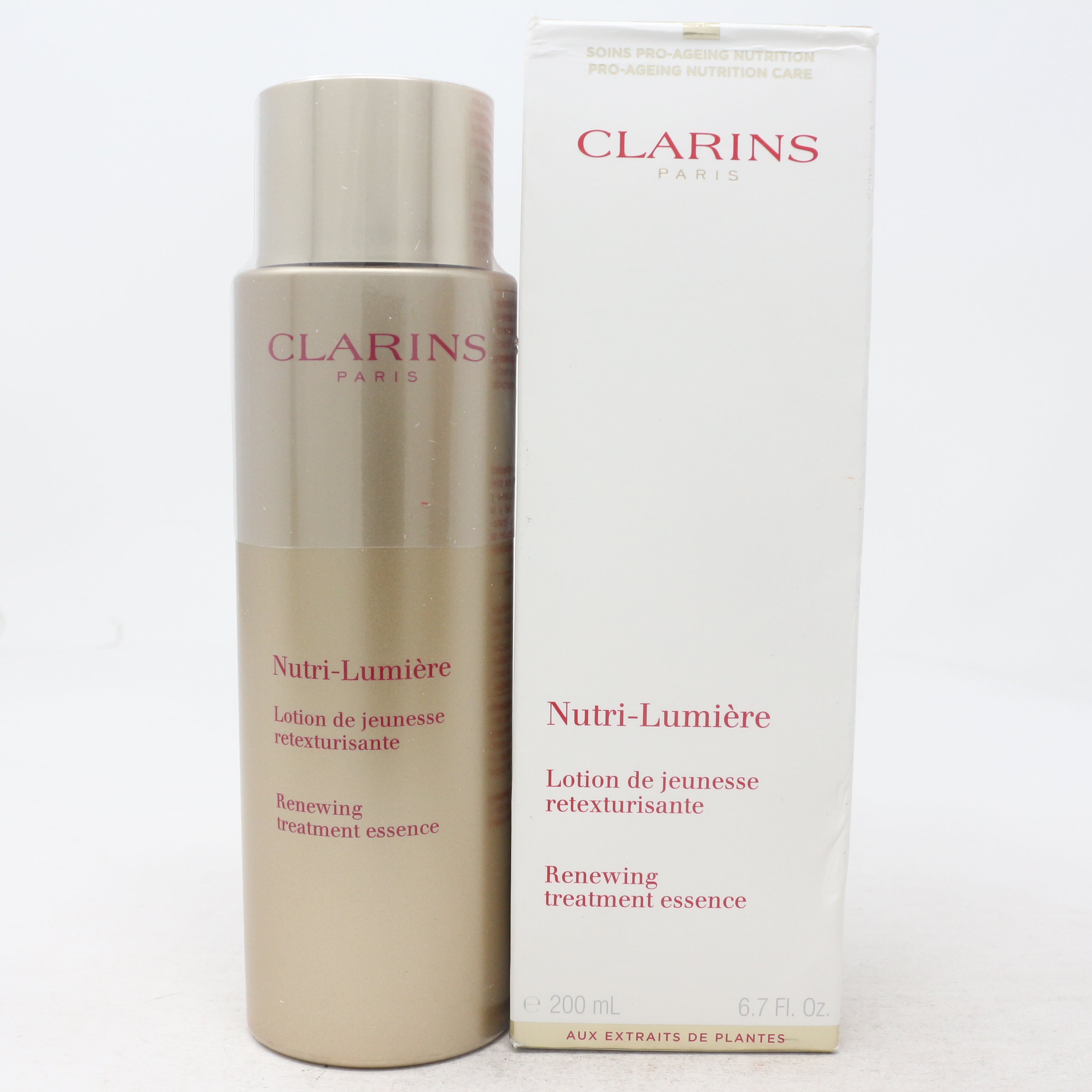 Clarins Nutri-Lumiere Renewing Treatment Essence 6.7oz/200ml New With Box