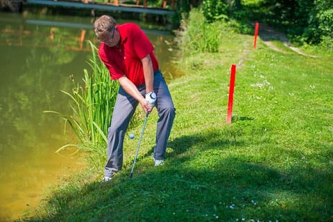 hitting golf ball out of water hazard