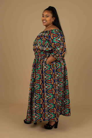 Hand crafted, ethically made African print crop top and maxi skirt set made from Ankara wax print in a geo-shaped multicoloured African Print pattern.