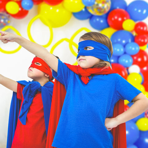 hedgehog sonic balloon garland kit with boys standing in front of it and wearing superhero masks