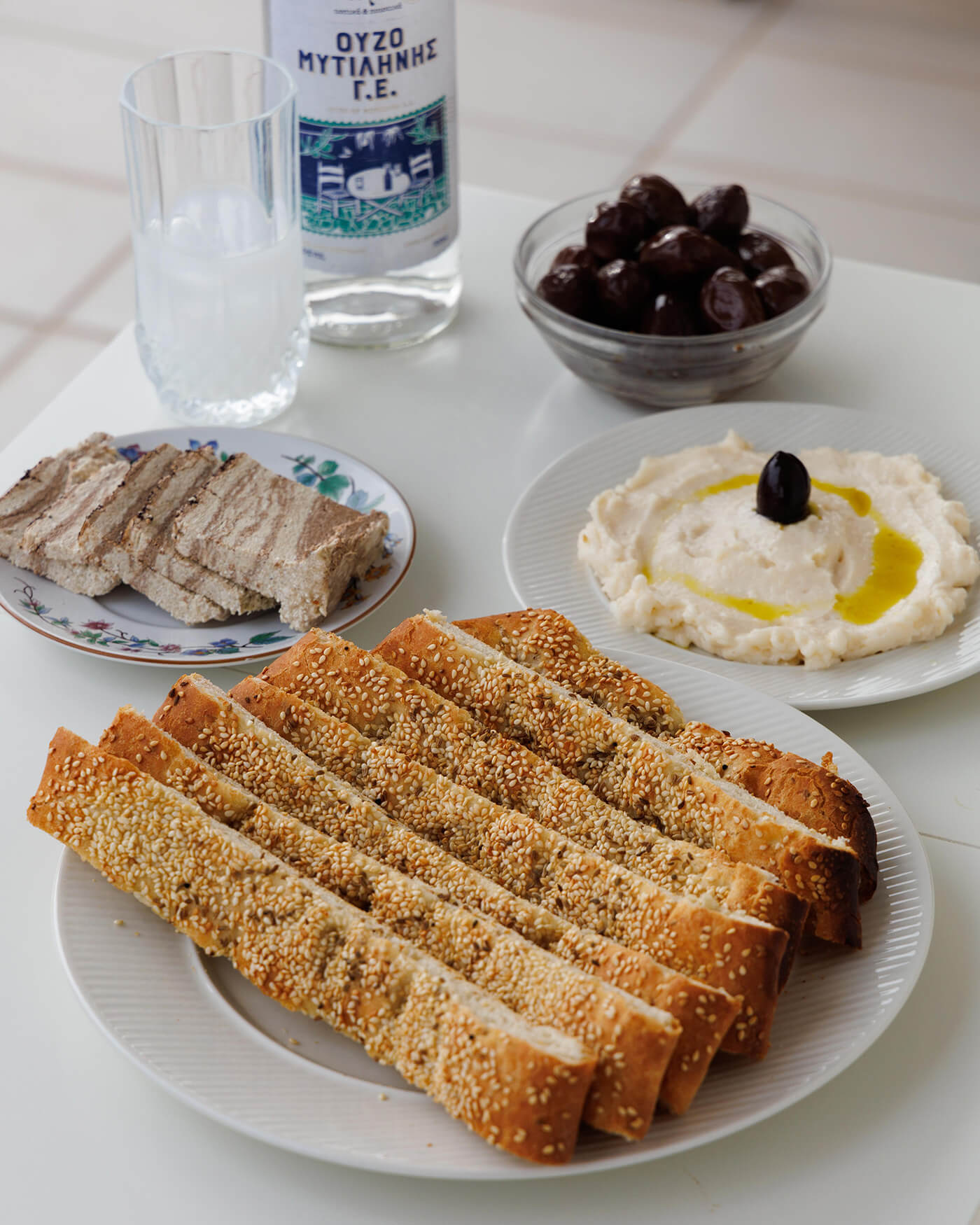 lagana greek bread, taramasalata, greek olives