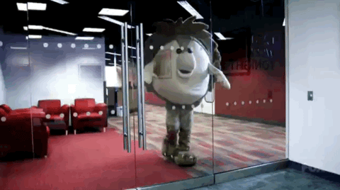 mascot walking into glass door