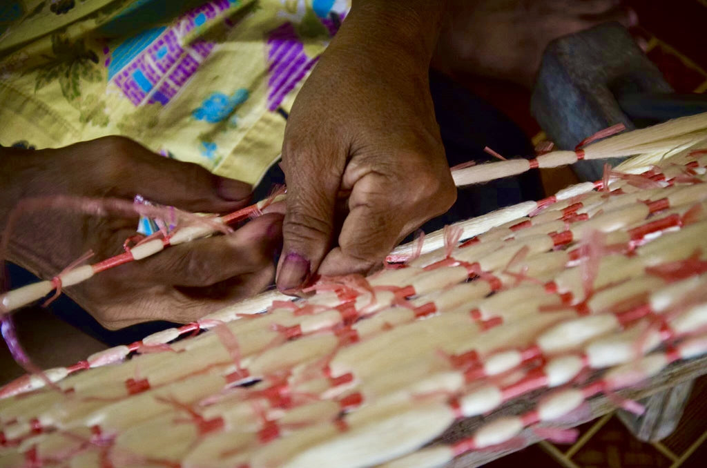 Tying the pure silk thread ready for ikat dying