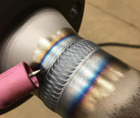 A greater output frequency of AC is important when TIG welding tight spaces