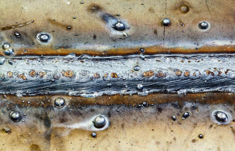 Spatter is a common defect that leaves a sloppy weld appearance.