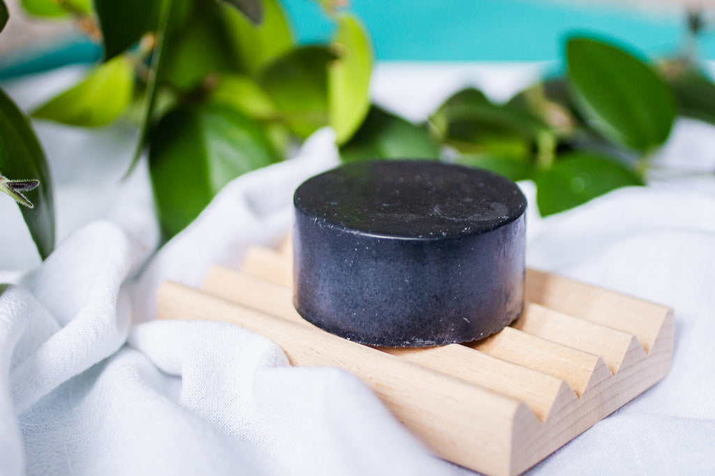 A Drop in the Ocean Zero Waste Charcoal Face Bar on Natural Beechwood Soap Dish
