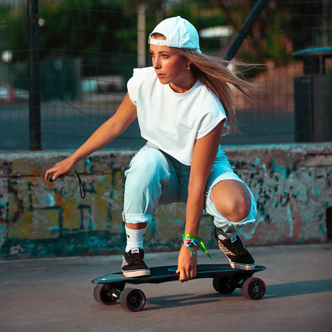 Girl on electric skateboard