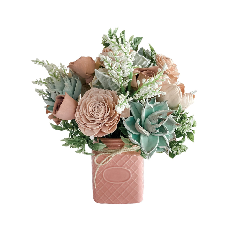 bake shoppe pink succulent sola flower centerpiece with pink waffle vase