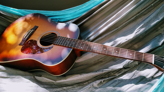 Acoustic guitar Photo by Rebecca Swafford on Pexels