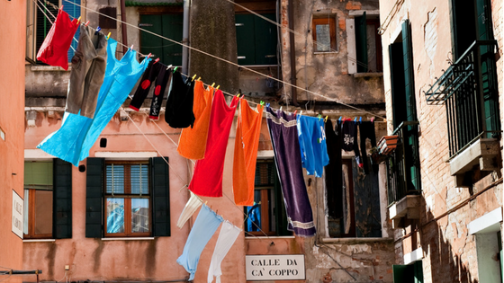 Clothes Hanging. Photo by Marco Secchi on Unsplash.