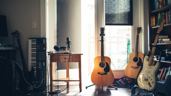 Guitars inside a room Photo by Wes Hicks on Unsplash