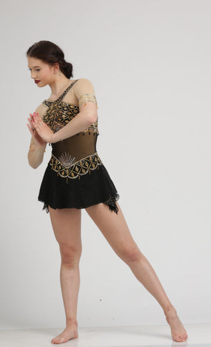 black and gold figure skating dresses