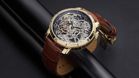 Tufina Theorema Rio, gold plated watch for men with a skeleton dial, thin black and white hands and a brown leather band