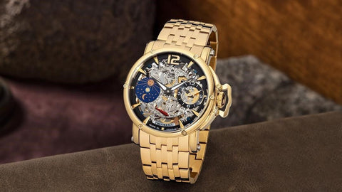 Tufina Theorema Copacabana, German watch for men with an IPG gold plated case, skeleton dial, sun and moon phase indicator and a metal bracelet