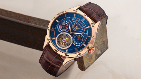 A fantastic watch open-heart face with 12 diamonds. Brown leather strap, red subdials, and a nice mixture of rose and gold face color. This is the Geneva Tourbillon model from Tufina Watches.